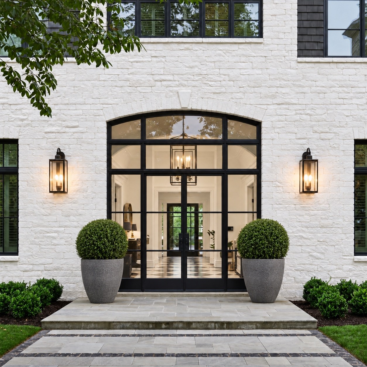 Bel Air residence entrance with white brick and black-framed doors