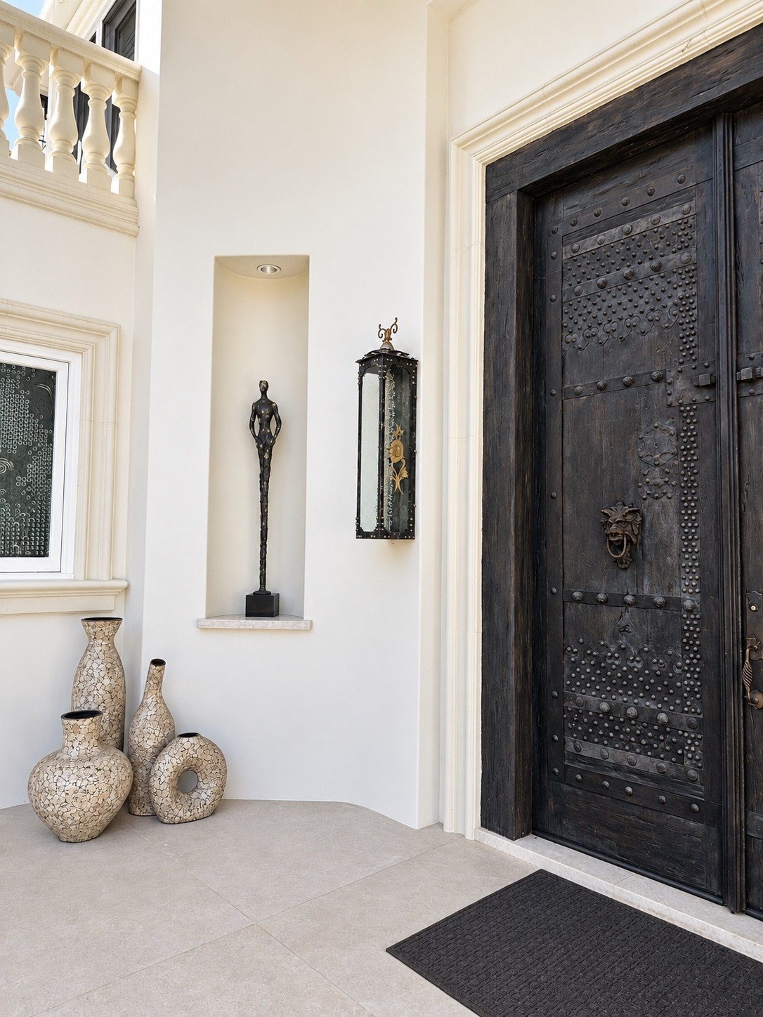 Entrance detailing and sculptural accents