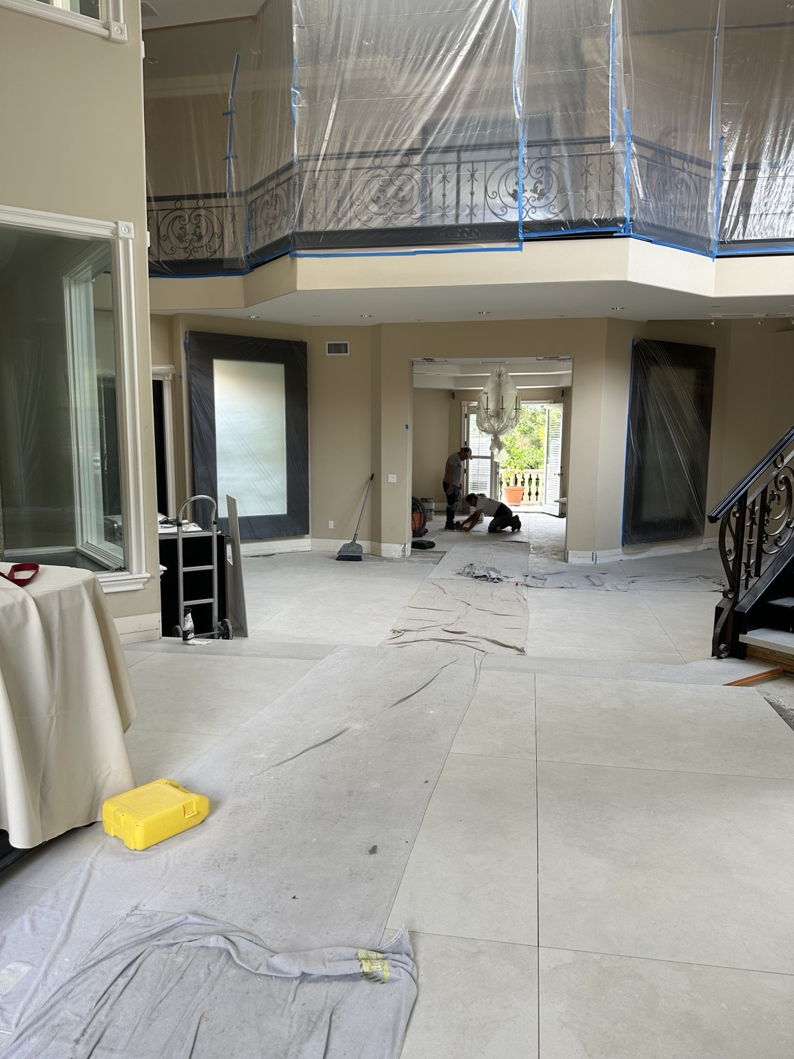 Protected upper-level railings during interior work