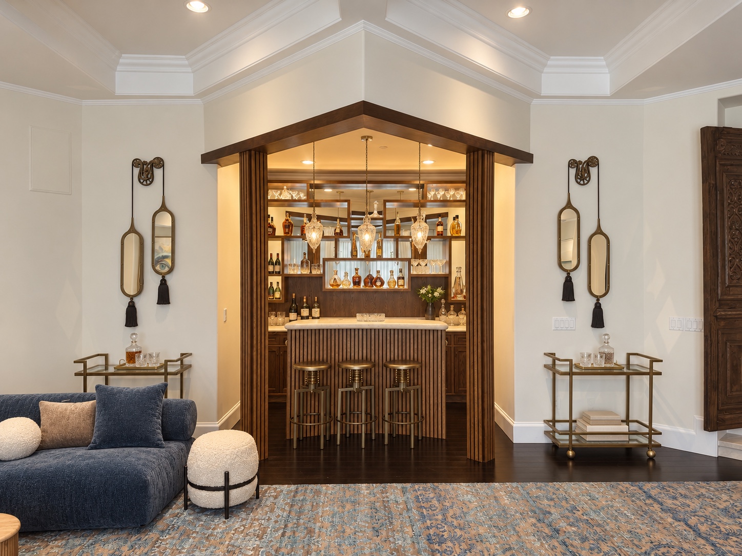 Entertainment lounge bar with fluted wood cabinetry and pendant lights
