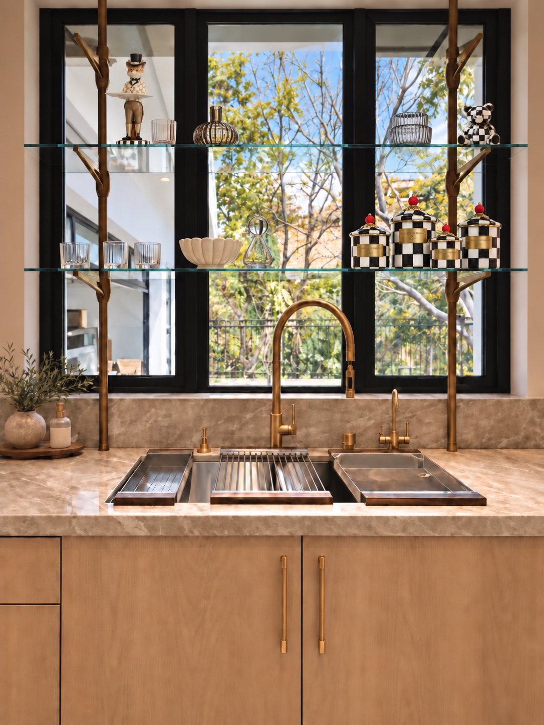Kitchen sink with brass faucet